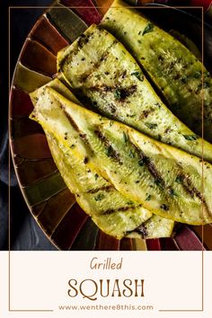 grilled squash on a plate with the words grilled squash