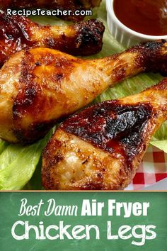 the best damn air fryer chicken legs recipe on a plate with lettuce