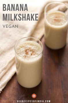 two glasses of banana milkshake on a wooden table