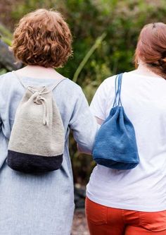 Two women wearing bags Round Bags, Designer Cosmetic Bag, Clutch Pattern, Custom Handbags, Linen Stitch, Stylish Purse, Bucket Bags, Large Pouch, Pouch Pattern