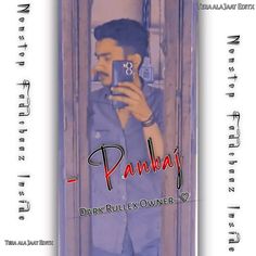 a man taking a selfie in front of a door with the words pankaj on it