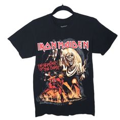 Iron Maiden The Number Of The Beast Graphic T-Shirt Black Small Brand: Iron Maiden Size: Small Size Type: Regular Style: Graphic Tee Type: T-Shirt Color: Black Red Neckline: Crew Neck Material: 100% Cotton Pattern: Solid Sleeve Length: Short Sleeve Features: Front Graphics Closure: Pullover Condition: Pre-Owned, In Good Condition. Measurement: Chest Size: 17” Length: 26” - We Sell Nwt / Pre Owned, Clean No Flaw Items Unless Stated. See Photos For More Details. Questions Welcome. Thanks For Shopp Iron Maiden T Shirt, Iron Maiden Shirt, Black Hoodie Women, Cropped White Tee, Style Graphic Tee, Cropped Tee Shirt, Paint Shirts, Moon Shirt, Short Sleeve Pullover