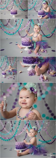 a baby is sitting in front of a cake with purple and blue decorations on it