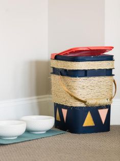 two bowls and a basket on the floor