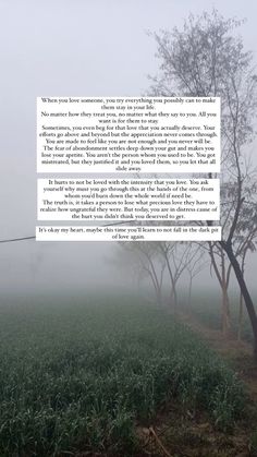 a foggy field with trees in the distance and a poem written on it that reads,