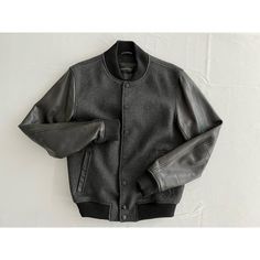 "Wool and leather bomber style jacket by Danier.   Grey wool with a black leather sleeves for a sleek tonal look. Excellent layering piece, great staple that you will have forever. Marked size small-may be mens small since it fits more like a women's medium Chest 39\" Waist 29\" Sleeve 26\" Shoulders 17.5\" Length 24.5\" 60% wool 40% polyester  genuine leather  lining 50% cotton 50% polyester Condition is excellent; shows no signs of wear" Leather Jacket With Ribbed Cuffs For Streetwear, Fitted Urban Varsity Jacket For Fall, Tailored Wool Varsity Jacket For Fall, Winter Black Leather Jacket With Ribbed Cuffs, Black Leather Jacket With Ribbed Cuffs For Winter, Fitted Leather Varsity Jacket With Long Sleeves, Black Leather Outerwear With Ribbed Cuffs, Fitted Leather Varsity Jacket For Winter, Fitted Leather Varsity Jacket