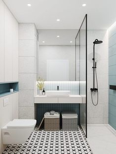 a bathroom with a black and white tile floor