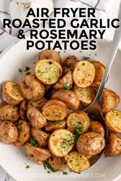 Air Fryer Roasted Garlic and Rosemary Potatoes in a serving dish with writing. Garlic Herb Potatoes Air Fryer, Air Fryer Rosemary Roasted Potatoes, Air Fryer Rosemary Potatoes, Garlic Roasted Potatoes Air Fryer, Garlic Potatoes In Air Fryer, Air Fryer Garlic Potatoes, Creamer Potatoes Air Fryer, Roasted Baby Potatoes Air Fryer, Creamer Potato Recipes