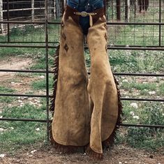 "Description Handmade Rodeo Cowboy Style Suede Leather Pant Chap Mountain Cowgirl Western Cowboy chaps  Description and Features An authentic, high quality and great value item. You're only paying a couple of extra for a real leather product- we never compromise on the quality so you may buy with full confidence. Professionally designed and manufactured with great attention to Men Suede Western Style Leather Pant With Fringes. All Colours are available on demand * Size Type: Regular * Handmade Yes * Outer Shell Material: Suede and its thickness is 1.5 mm * Style: Western Style * Closure: Zipper * Theme: Western * Fit: Regular * Type: Cowboy Pant * Department: Unisex * Stich Material: Polyester * Season: All * Occasion: Casual * Country/Region of Manufacture: Pakistan * Material: Cowhide * Leather Chaps American Legend Rider, Bachelorette Chaps, Edc Chaps, Mountain Cowgirl, Cowgirl Chaps, Cowboy Chaps, Western Cowgirl Style, Cowboy Pants, Cowboy Costume