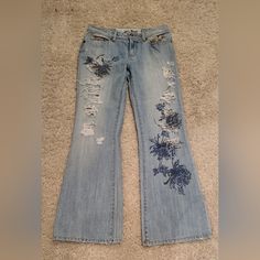 Nwot Size 9 Denim Ripped Jeans Color Blue Full Length Questions? Leave A Comment Below! Spring Floral Embroidered Cotton Flare Jeans, Blue Distressed Flare Jeans For Spring, Fitted Denim Blue Jeans With Floral Print, Denim Blue Jeans With Floral Print, Fitted Floral Print Jeans In Denim Blue, Fitted Floral Print Denim Blue Jeans, Blue Denim Jeans With Floral Print, Fitted Floral Print Denim Jeans, 2000 Jeans