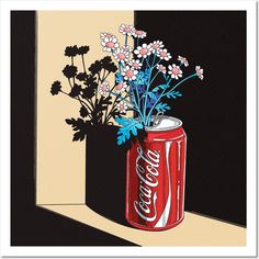 a pink coca - cola can with flowers in it