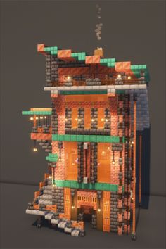 an image of a building made out of lego blocks with lights on the top and bottom floors