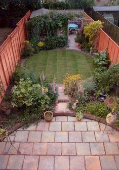 an aerial view of a backyard with brick pavers