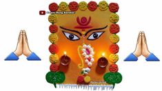 the face of lord ganesha is decorated with colorful garlands and candles for diwaling