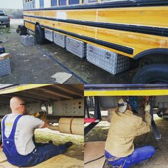 two men working on the underside of a school bus