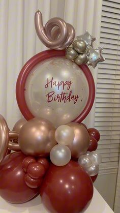 a bunch of balloons that are on top of a table