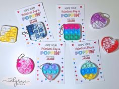 four valentine's day cards with magnets in the shape of heart shaped boxes