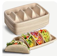 three burritos, one with lettuce and tomatoes on it next to a tray filled with tortillas