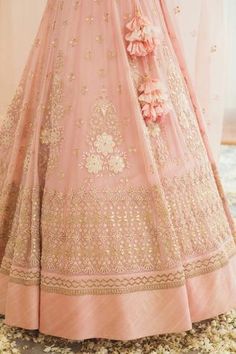 Crystal rose lehenga with chikankari embroidery and gota patti work. Comes with blouse and dupatta.
Component: 3
Embroidery
Neckline: Scoop
Sleeve Length: Three Quarter
Fabric: Silk; Lining: Shantoon
Color: Pink
Embellished dupatta with cutwork and tassels
Closure: Side zip with tie up and tassels
Note: Hair accessory worn by the model is not for sale - Aza Fashions Pink Chikankari Embroidery Semi-stitched Lehenga, Pink Chikankari Embroidery Lehenga, Pink Choli With Chikankari Embroidery, Eid Pink Choli With Chikankari Embroidery, Pink Lehenga With Chikankari Embroidery For Reception, Pink Anarkali Choli With Chikankari Embroidery, Pink Choli With Chikankari Embroidery For Navratri, Pink Chikankari Embroidered Choli For Navratri, Pink Chikankari Embroidery Choli For Navratri