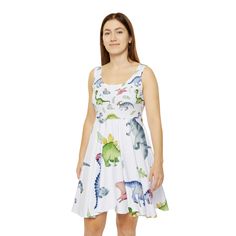 Whether it's hitting the town or lounging around, this custom skater dress brings an unmatched flair to any woman's wardrobe. Made with a high-quality, 290gsm fabric blend that is 83% polyester, 17% spandex, it's comfy, stretchy and a perfect match to any occasion. Add your art in an all-over print and create an instant favorite for any day of the week.  .: Material: 83% polyester, 17% spandex .: Medium-heavy fabric (8.5 oz /yd² (290 g/m .: Mid-length .: Seam thread color automatically matched t Girly Dinosaur, Dino Dress, Dinosaur Dress, Fun Dress, Asymmetrical Skirt, Women's Wardrobe, All Over, Dress Clothes For Women, Skater Dress