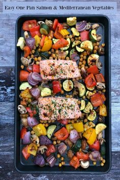 salmon and vegetables on a tray with the title easy one pan salmon and mediterranean veggies