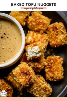 baked tofu nuggets on a plate with dipping sauce