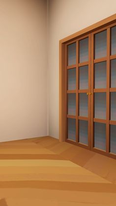 an empty room with wooden floors and glass doors