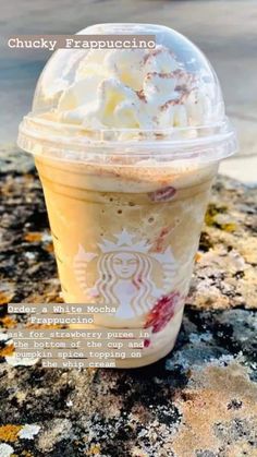 a close up of a cup of food on a rock with the words chucky frappuccino