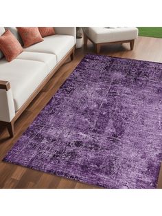 a purple area rug in a living room