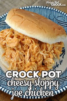 crock pot cheesy sloppy joe chicken sandwich on a blue and white plate