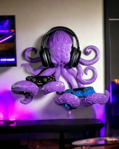 an octopus with headphones hanging on the wall