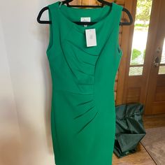 Perfect Condition Green Fitted Pleated Dresses, Green Sheath Dress For The Office, Green Lined Dress For Workwear, Green Lined Dresses For Work, Elegant Green Pleated Sleeveless Dress, Green Fitted Sleeveless Dress For Work, New York Dresses, Green Mini Dress, York Dress