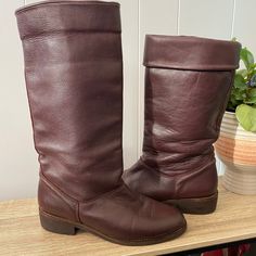 Gorgeous roll down leather Roots boots. Vintage style. Wine/maroon colour leather with light wear (mostly inside the cuff). Can be worn rolled up or down. Slouchy style. Leather cleaned and conditioned. Size 6.5 B. Boots stuffed for photos. Inside is stamped: 266 10 6 1/2B Winter Knee-high Burgundy Boots, Fall Burgundy Boots With Leather Lining, Burgundy Knee-high Winter Boots, Burgundy Knee-high Boots For Winter, Burgundy Leather Knee-high Boots, Maroon Colour, Slouch Boots, Slouchy Style, Boots Vintage