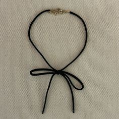 Nwot Black Suede Bow Choker Necklace Adjustable Gold Clasp/Chain Goes Up To 14" No Returns Or Exchanges Fall Trend - Must Have Very J. Crew - Anthropologie - Boden - Banana Republic - Vineyard Vines - Nordstrom - Gucci - Theory - Lacoste - Ann Taylor - Zara - Tuckernuck - Veronica Beard - Staud Black Bow Choker, Elegant Black Necklace With Adjustable Cord, Black Adjustable Choker For Party, Elegant Black Choker With Adjustable Length, Adjustable Black Necklace With Black Ribbon, Bow Choker, Fall Trend, Jewelry Accessories Ideas, Anthropologie Jewelry