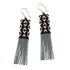 These beaded fringe earrings have a bold patterned top that flows to swingy fringe. Great day into night style! Glass beads with a gold-plated ear wire. 3.25" long. Made by artisans in Guatemala Artisan Fringe Dangle Earrings, Artisan Fringe Drop Earrings, Artisan Dangle Tassel Earrings With Fringe, Artisan Fringe Tassel Dangle Earrings, Artisan Tassel Dangle Earrings With Fringe, Elegant Beaded Earrings With Fringe For Festivals, Elegant Beaded Fringe Earrings For Festivals, Resort Jewelry, Beaded Fringe Earrings