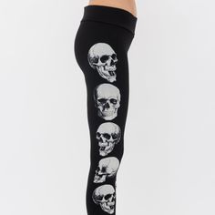 Women's Vocal Apparel Leggings White Skull Graphics Down Each Leg Very Comfortable Color - Black/White Size - Various 92% Rayon 8% Spandex V069 Punk Bottoms With Skull Print For Halloween, Black Skull Print Bottoms For Halloween, Halloween Skull Print Bottoms For Alternative Fashion, Edgy Skull Print Bottoms For Alternative Fashion, Edgy Bottoms With Skull Print For Alternative Fashion, Punk Halloween Bottoms With Skull Print, Alternative Fashion Black Bottoms With Skull Print, Casual Black Pants With Skull Print, Fitted Halloween Bottoms With Skull Print