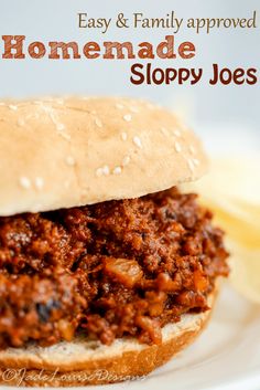 a sloppy joe sandwich on a plate with the words easy and family approved homemade sloppy joes