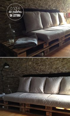 a couch made out of wooden pallets with pillows on top and the bottom half