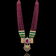 Our Saarika Look sets the mood for vintage glamour with Mughal undertones! A stunning mala necklace in colorful combination of ruby, emerald and CZ stones and beads. Approximate mala length is 15". The look includes a pair beautiful jhumkey earrings. Approximate earrings length is 3.5". Gold-plated on high-quality brass as base metal. In-stock & ready-to-ship. *Please Note: We use faux stones and beads in all of our jewelry. Temple Jewelry Style Mala For Festive Occasions, Temple Jewelry Long Mala For Festive Occasions, Temple Jewelry Bridal Kundan Necklace, Festive Temple Jewelry Style Gemstone Beaded Necklaces, Temple Jewelry Mala For Festive Occasions, Festive Temple Jewelry Beaded Gemstone Necklaces, Festive Temple Jewelry Beaded Gemstone Necklace, Festive Temple Jewelry Gemstone Beaded Necklace, Festive Gemstone Beaded Necklace In Temple Style