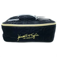 Kendall + Kylie Spacious Black Quilted Velvet Vanity Case with black patent leather and gold accents. Perfect for storage of your favorite personal care items and convenient size for travel. This chic bag would be a perfect addition to any collection. Luxury Black Rectangular Cosmetic Bag, Rectangular Black Cosmetic Bag Gift, Luxury Black Cosmetic Bag For Travel, Black Rectangular Cosmetic Bag, Luxury Black Travel Cosmetic Bag, Black Rectangular Cosmetic Bag Gift, Black Rectangular Cosmetic Storage Bag, Portable Black Cosmetic Bag For On-the-go, Black Rectangular Case With Zipper Closure