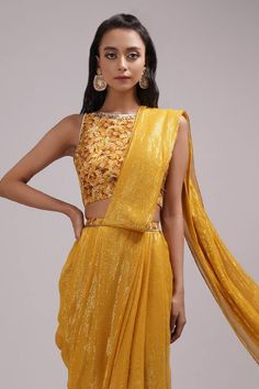 Mustard cowl draped saree with silver lining work. Paired with rose print pant and padded blouse. - Aza Fashions Evening Pre-draped Tissue Silk Saree For Festivals, Evening Tissue Silk Pre-draped Saree For Festivals, Elegant Pre-draped Saree For Festivals, Draped Blouse Piece For Evening Festivals, Draped Saree For Party And Navratri, Elegant Draped Blouse For Festivals, Party Saree For Eid, Draped Style, Eid Party Draped Saree, Designer Draped Tissue Silk Blouse Piece