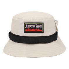 PRICES MAY VARY. CUSTOM DESIGN: Stand out with a custom-designed bucket hat that perfectly captures the essence of Jurassic Park with the movie's title hovering above lush red foliage. The woven label adds an authentic touch to your look. SIDE POCKET: This hat comes with a fleece-lined side pocket, adding both style and practicality to your accessory. Store small essentials with ease while embracing the adventurous spirit of the movie. OFFICIALLY LICENSED: This bucket hat is officially licensed, White Flat Brim Bucket Hat For Streetwear, Adjustable Bucket Hat With Letter Print For Outdoor, White Retro Adjustable Bucket Hat, Retro White Adjustable Bucket Hat, Adjustable Outdoor Bucket Hat With Letter Print, White Adjustable Retro Bucket Hat, White Flat Brim Bucket Hat For Outdoor, Adjustable Bucket Hat With Letter Print For Streetwear, Adjustable Letter Print Bucket Hat For Streetwear