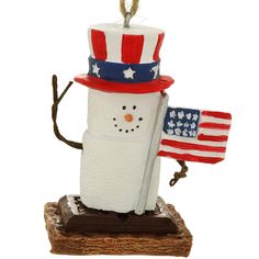 a snowman with an american flag hat on it's head