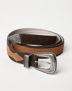 Two-tone reversed calfskin belt with detailed buckle and tip The excellence of materials and workmanship give a distinct personality to this two-tone belt in reversed calfskin. The leather’s characteristic, irregular texture is skillfully balanced by the detailed buckle and metal tip. Brown Accessories, Braided Belt, Brunello Cucinelli Men, Boutique Online, Western Design, Brown Belt, Men's Beauty, Leather Belts, Harrods