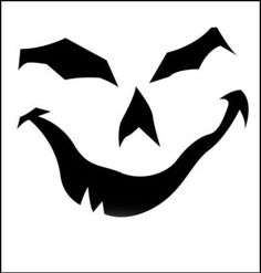 a black and white image of an evil face with sharp fangs on it's teeth