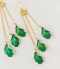 * Use discount FOURITEMS to get 10% off when you purchase 4 items or more across all our products (jewelry, ceremony items, etc) * Designed and handcrafted in the Philippines by Filipino women artisans * This handmade tropical drop earrings is made of gold-plated hooks and acrylic/resin leaves from Manila * Locally sourced materials to support traditional crafts * 5.5 inches in length, lightweight to wear all day * Each piece features 'intentional imperfections' - variations in exact size, cut, Filipino Jewelry, Resin Leaves, Pride Jewellery, Beautiful Veil, Traditional Crafts, Shell Earrings, Women Artisans, Star Earrings, Unique Earrings