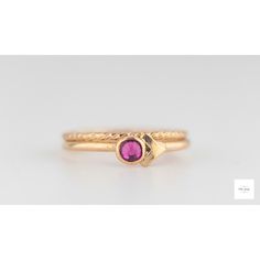 This beautiful set of elegant, handmade stacking rings feature a shimmering fuchsia (dark pink, magenta) colored cubic zirconia stone set in a gold filled bezel atop two gold-filled textured ring bands. The deep, sparkling color of the dark pink fuchsia pink cubic zirconia pairs perfectly with the bright gold lending a royal color combination and timeless beauty to the rings. US size 6, EU size 51.5: inside circumference is 2.04 inches, 51.9mm