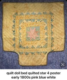 an old quilt is on display with the words quilt all quilted star 4 poster early 1800's pink blue white