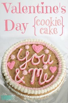 a valentine's day cookie cake with pink icing