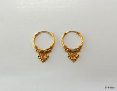 Traditional Gold Plated Hoop Earrings, Traditional Hoop Huggie Earrings Gift, Hoop Temple Jewelry Earrings, Traditional Small Hoop Gold Plated Earrings, Traditional Small Hoop Huggie Earrings For Gifts, Traditional Small Huggie Earrings As A Gift, Traditional Hallmarked Hoop Earrings As Gift, Traditional Gold Plated Single Plug Earring, Temple Jewelry Round Hoop Earrings For Celebration